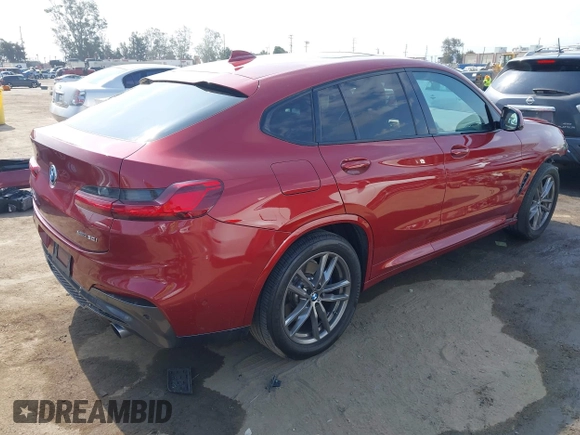 2021 BMW X4 xDrive30i with VIN 5UX2V1C09M9F29509, listed as a IAAI auction lot 42408605 with 46,992 mi miles and . Bid and sale history available at DreamBid. Image 4.