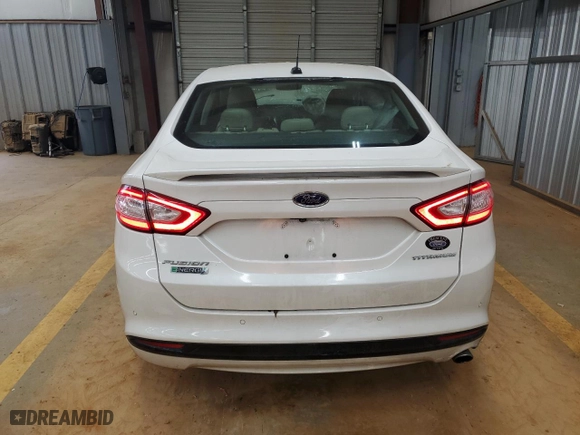 2016 Ford Fusion Energi Titanium with VIN 3FA6P0SUXGR129952, listed as a Copart auction lot 46077345 with 47,977 mi miles and Salvage Title. Bid and sale history available at carsss.com. Image 6.