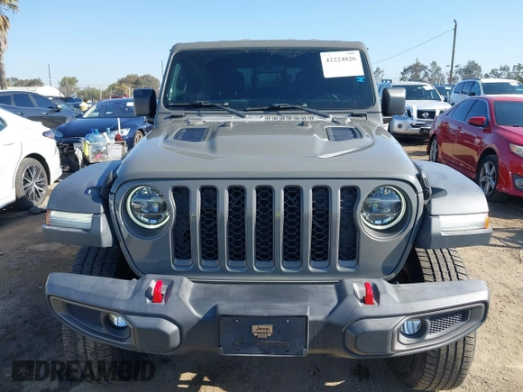 2020 Jeep Gladiator Rubicon with VIN 1C6JJTBG6LL149469, listed as a IAAI auction lot 42224826 with 58,870 mi miles and . Bid and sale history available at DreamBid. Image 13.