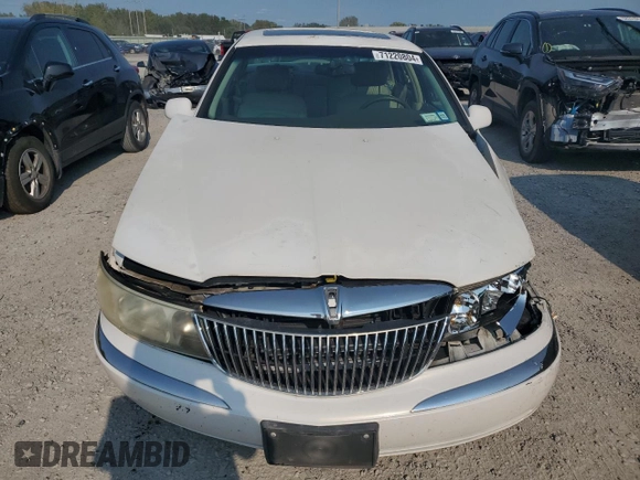 2001 Lincoln Continental with VIN 1LNHM97V91Y659769, listed as a Copart auction lot 71220804 with 0 mi miles and Salvage Title. Bid and sale history available at carsss.com. Image 5.