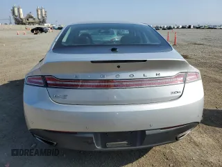 2014 Lincoln MKZ Hybrid z VIN 3LN6L2LU7ER821918, wystawiony jako Copart lot #60754555 z przebiegiem 128 295 mil mil oraz Szkoda całkowita • Salvage title. Historia ofert i sprzedaży dostępna na DreamBid. Obrazek 6.