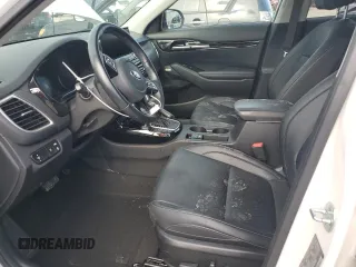 2021 Kia Seltos SX with VIN KNDETCA20M7078855, listed as a Copart auction lot 58071695 with 50,951 mi miles and Salvage title. Bid and sale history available at DreamBid. Image 7.