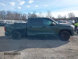 2023 Toyota Tundra Limited with VIN 5TFJA5DBXPX081603, listed as a IAAI auction lot 41293156 with 15,155 mi miles and . Bid and sale history available at DreamBid. Image 13.