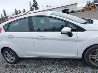 2019 Ford Fiesta SE with VIN 3FADP4EJ9KM156808, listed as a IAAI auction lot 41794629 with 115,560 mi miles. Bid and sale history available at carsss.com. Image 13.