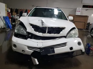 2006 Lexus RX 400h with VIN JTJHW31U960017115, listed as a Copart auction lot 45548935 with 330,629 mi miles and Salvage title. Bid and sale history available at DreamBid. Image 5.