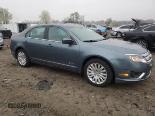 2012 Ford Fusion Hybrid z VIN 3FADP0L35CR425873, wystawiony jako Copart lot #50870905 z przebiegiem 75 133 mil mil oraz Szkoda całkowita • Salvage title. Historia ofert i sprzedaży dostępna na DreamBid. Obrazek 4.