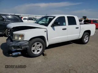 2011 Dodge Dakota с VIN 1D7RE3GP6BS648842, выставлен на аукционе Copart как лот 55478375 с пробегом 102 974 миль миль и Списание • Salvage title. История ставок и продаж доступна на DreamBid. Изображение 1.