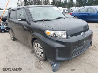 2011 Scion xB with VIN JTLZE4FE2B1135095, listed as a IAAI auction lot 41724157 with 202,311 mi miles. Bid and sale history available at carsss.com. Image 1.