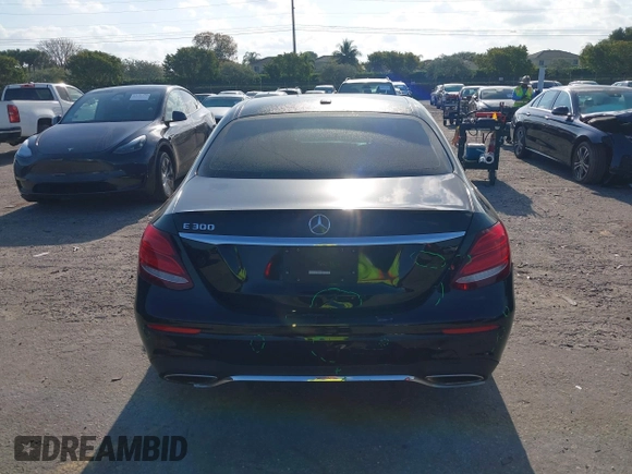 2018 Mercedes-Benz E 300 with VIN WDDZF4JB5JA380872, listed as a IAAI auction lot 42048785 with 94,574 mi miles and . Bid and sale history available at DreamBid. Image 16.