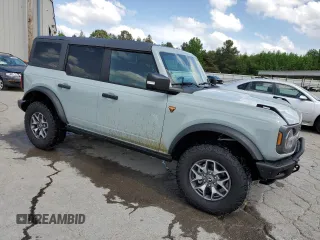 2023 Ford Bronco z VIN 1FMEE5DP8PLB29801, wystawiony jako Copart lot #55086715 z przebiegiem 14 826 mil mil oraz Szkoda całkowita • Salvage title. Historia ofert i sprzedaży dostępna na DreamBid. Obrazek 4.
