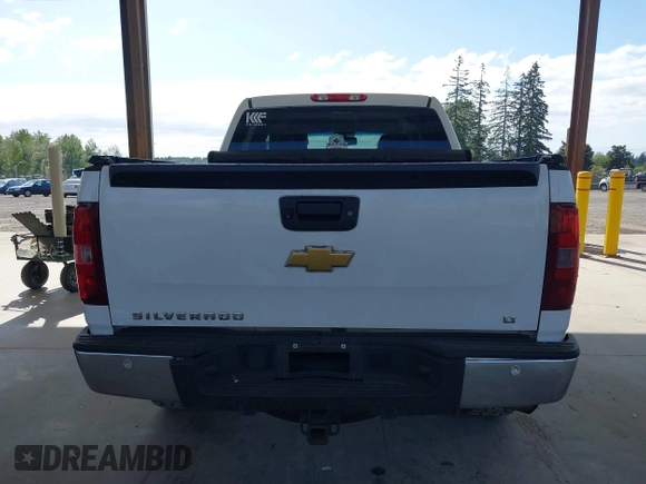2013 Chevrolet Silverado 1500 LT with VIN 3GCPKSE71DG358722, listed as a IAAI auction lot 42128592 with 206,779 mi miles and . Bid and sale history available at DreamBid. Image 16.