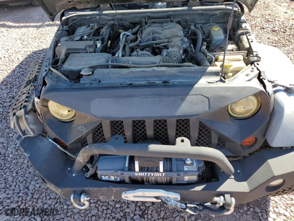 2012 Jeep Wrangler Unlimited Sport with VIN 1C4BJWDGXCL161569, listed as a Copart auction lot 50456355 with 133,703 mi miles and Salvage Title. Bid and sale history available at carsss.com. Image 13.