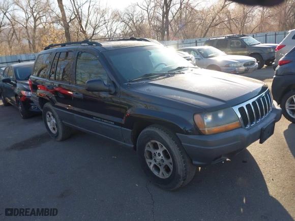 2001 Jeep Grand Cherokee Laredo with VIN 1J4GW48S51C517217, listed as a IAAI auction lot 41773968 with 189,350 mi miles. Bid and sale history available at carsss.com. Image 1.