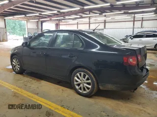 2010 Volkswagen Jetta Limited Edition with VIN 3VWAX7AJ4AM162032, listed as a Copart auction lot 56274115 with 164,642 mi miles and Salvage title. Bid and sale history available at DreamBid. Image 2.