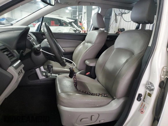 2014 Subaru Forester Touring with VIN JF2SJAPC7EH419677, listed as a Copart auction lot 59810655 with 174,697 mi miles and Salvage title. Bid and sale history available at DreamBid. Image 7.
