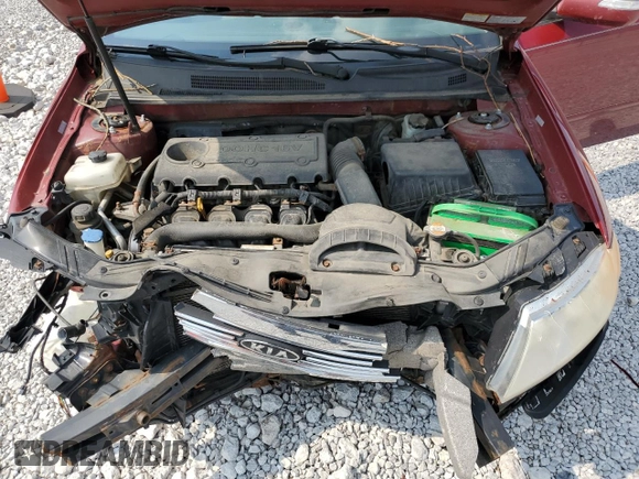 2009 Kia Optima LX z VIN KNAGE228795334599, wystawiony jako Copart lot #59276515 z przebiegiem 180 399 mil mil oraz Szkoda całkowita • Salvage title. Historia ofert i sprzedaży dostępna na DreamBid. Obrazek 11.