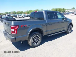2018 Ford F-150 XL with VIN 1FTEW1EG2JFE55513, listed as a IAAI auction lot 41530354 with 132,617 mi miles. Bid and sale history available at carsss.com. Image 4.