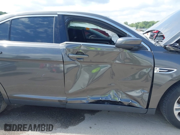 2015 Ford Taurus SEL with VIN 1FAHP2E83FG175051, listed as a IAAI auction lot 42357517 with 200,033 mi miles and . Bid and sale history available at DreamBid. Image 6.