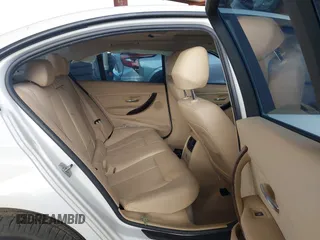 2014 BMW 3 Series 328i with VIN WBA3C1C53EK113046, listed as a IAAI auction lot 42665663 with Not provided miles and . Bid and sale history available at DreamBid. Image 8.