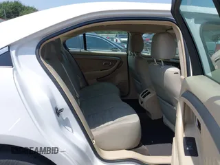 2015 Ford Taurus SE with VIN 1FAHP2D8XFG105029, listed as a IAAI auction lot 42068632 with 164,098 mi miles and . Bid and sale history available at carsss.com. Image 8.