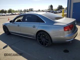 2012 Audi A8 z VIN WAURVAFD7CN023286, wystawiony jako Copart lot #56594745 z przebiegiem 199 443 mil mil oraz Czysty tytuł • Clean title. Historia ofert i sprzedaży dostępna na DreamBid. Obrazek 2.