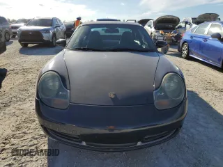 2000 Porsche 911 z VIN WP0AA2996YS621130, wystawiony jako Copart lot #77096434 z przebiegiem Nie podano mil oraz Szkoda całkowita • Salvage title. Historia ofert i sprzedaży dostępna na DreamBid. Obrazek 5.