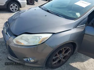 2013 Ford Focus SE with VIN 1FADP3F28DL233822, listed as a IAAI auction lot 42583041 with 135,728 mi miles and . Bid and sale history available at DreamBid. Image 15.