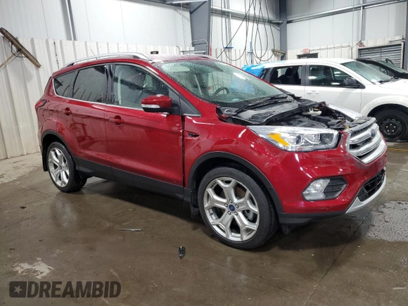 2019 Ford Escape Titanium with VIN 1FMCU9J9XKUA41715, listed as a Copart auction lot 57483725 with 30,644 mi miles and Salvage title. Bid and sale history available at DreamBid. Image 4.