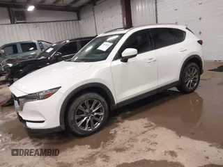 2019 Mazda CX-5 Signature with VIN JM3KFBEY5K0520593, listed as a IAAI auction lot 41638594 with 111,504 mi miles. Bid and sale history available at carsss.com. Image 17.