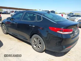 2016 Kia Optima LX Turbo with VIN 5XXGT4L12GG002889, listed as a IAAI auction lot 41989834 with 107,421 mi miles. Bid and sale history available at carsss.com. Image 3.