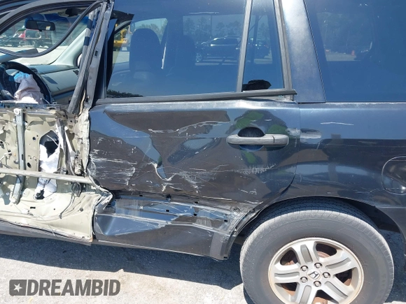 2005 Honda Pilot EX-L z VIN 5FNYF18515B042452, wystawiony jako IAAI lot #42270016 z przebiegiem 227 743 mil mil oraz . Historia ofert i sprzedaży dostępna na DreamBid. Obrazek 6.