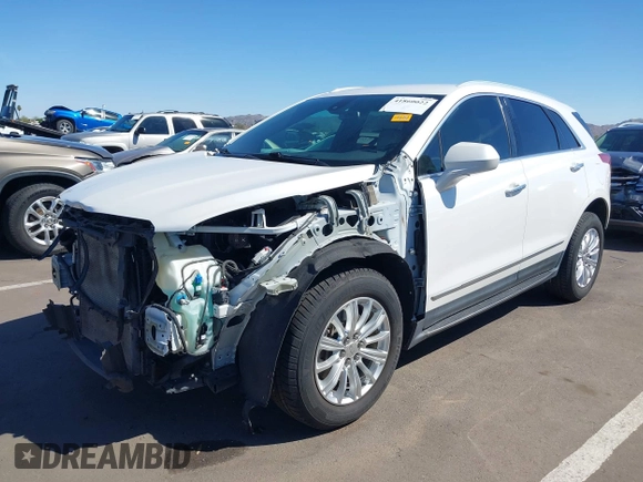 2019 Cadillac XT5 FWD with VIN 1GYKNARS1KZ135419, listed as a IAAI auction lot 41860022 with 63,395 mi miles and . Bid and sale history available at DreamBid. Image 6.