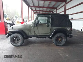 2005 Jeep Wrangler X z VIN 1J4FA39S75P310037, wystawiony jako IAAI lot #42186114 z przebiegiem 154 462 mil mil oraz . Historia ofert i sprzedaży dostępna na DreamBid. Obrazek 14.