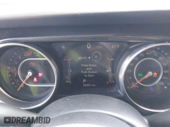 2020 Jeep Wrangler Unlimited Sahara z VIN 1C4HJXEN6LW106869, wystawiony jako IAAI lot #42390113 z przebiegiem 56 907 mil mil oraz . Historia ofert i sprzedaży dostępna na DreamBid. Obrazek 7.