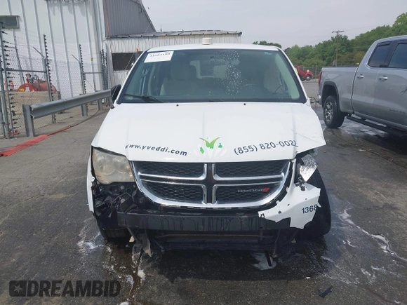 2014 Dodge Grand Caravan American Value with VIN 2C4RDGBG6ER380568, listed as a IAAI auction lot 41683180 with 303,612 mi miles and . Bid and sale history available at DreamBid. Image 12.