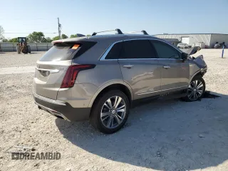 2022 Cadillac XT5 Premium Luxury AWD with VIN 1GYKNERS9NZ120517, listed as a Copart auction lot 52633745 with 31,456 mi miles and Salvage Title. Bid and sale history available at carsss.com. Image 3.