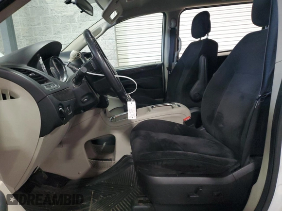 2014 Dodge Grand Caravan SXT with VIN 2C4RDGCG6ER427435, listed as a Copart auction lot 51957355 with 106,078 mi miles and Salvage Title. Bid and sale history available at DreamBid. Image 7.