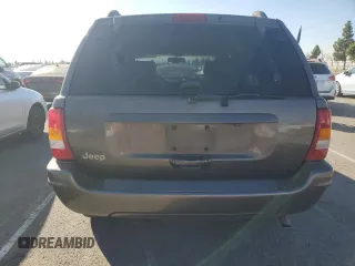 1999 Jeep Grand Cherokee Limited with VIN 1J4G268SXXC759016, listed as a Copart auction lot 80307534 with 215,870 mi miles and Salvage title. Bid and sale history available at DreamBid. Image 6.