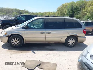 2005 Chrysler Town & Country Touring z VIN 2C4GP54L45R123762, wystawiony jako IAAI lot #42235745 z przebiegiem 217 713 mil mil oraz . Historia ofert i sprzedaży dostępna na DreamBid. Obrazek 14.