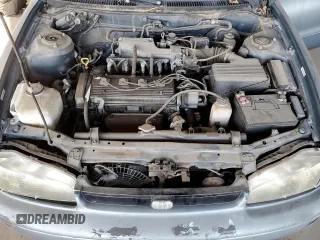 1995 Geo Prizm z VIN 1Y1SK5269SZ085206, wystawiony jako Copart lot #87645525 z przebiegiem 235 885 mil mil oraz Tytuł czysty. Historia ofert i sprzedaży dostępna na DreamBid. Obrazek 11.