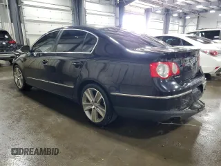 2010 Volkswagen Passat z VIN WVWJK9AN4AE096359, wystawiony jako Copart lot #50740075 z przebiegiem 196 126 mil mil oraz Szkoda całkowita • Salvage title. Historia ofert i sprzedaży dostępna na DreamBid. Obrazek 2.