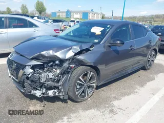 2022 Nissan Sentra SR z VIN 3N1AB8DV6NY230631, wystawiony jako IAAI lot #41974306 z przebiegiem 46 433 mil mil oraz . Historia ofert i sprzedaży dostępna na DreamBid. Obrazek 19.