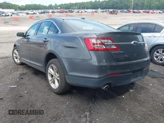 2017 Ford Taurus SEL with VIN 1FAHP2E82HG132551, listed as a IAAI auction lot 42633317 with 80,785 mi miles and . Bid and sale history available at DreamBid. Image 3.