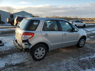2011 Suzuki SX4 with VIN JS2YA5A1XB6300445, listed as a Copart auction lot 84025004 with 213,385 mi miles and Clean Title. Bid and sale history available at DreamBid. Image 3.