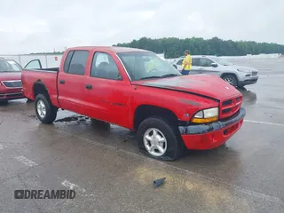 2000 Dodge Dakota Sport with VIN 1B7HG2AZ4YS711580, listed as a IAAI auction lot 42400349 with 216,057 mi miles and . Bid and sale history available at DreamBid. Image 1.