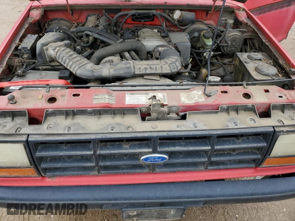1992 Ford Ranger z VIN 1FTCR14U3NPA43414, wystawiony jako Copart lot #62961125 z przebiegiem 50 828 mil mil oraz Czysty tytuł • Clean title. Historia ofert i sprzedaży dostępna na DreamBid. Obrazek 11.
