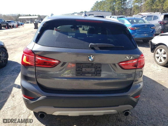 2018 BMW X1 xDrive28i with VIN WBXHT3C31J5K27206, listed as a Copart auction lot 45941755 with 99,777 mi miles and Salvage Title. Bid and sale history available at carsss.com. Image 6.