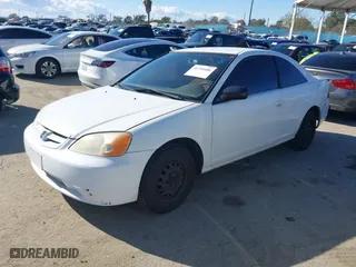 2002 Honda Civic LX with VIN 1HGEM22532L035360, listed as a IAAI auction lot 41759486 with 264,416 mi miles. Bid and sale history available at carsss.com. Image 2.