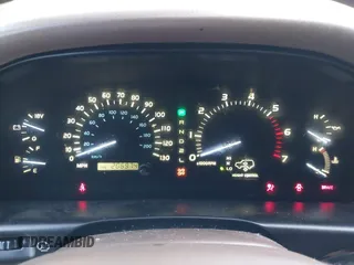 1999 Lexus LX 470 z VIN JT6HT00W4X0056023, wystawiony jako IAAI lot #41319329 z przebiegiem 206 974 mil mil oraz . Historia ofert i sprzedaży dostępna na DreamBid. Obrazek 7.