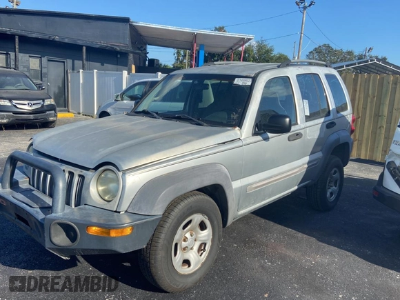 2002 Jeep Liberty Sport with VIN 1J4GL48K72W243074, listed as a Copart auction lot 80737354 with 127,177 mi miles and Clean Title. Bid and sale history available at carsss.com. Image 2.